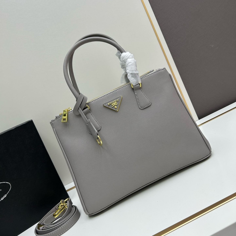 Pra*a top handle bags